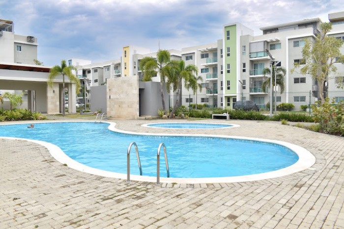 apartamentos - VENTA DE PRIMER NIVEL CON PATIO EN LOS LLANOS DE GURABO