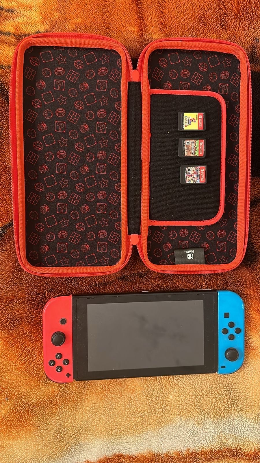 consolas y videojuegos -  Nintendo Switch con controladores Joy-Con rojo neón y azul neón