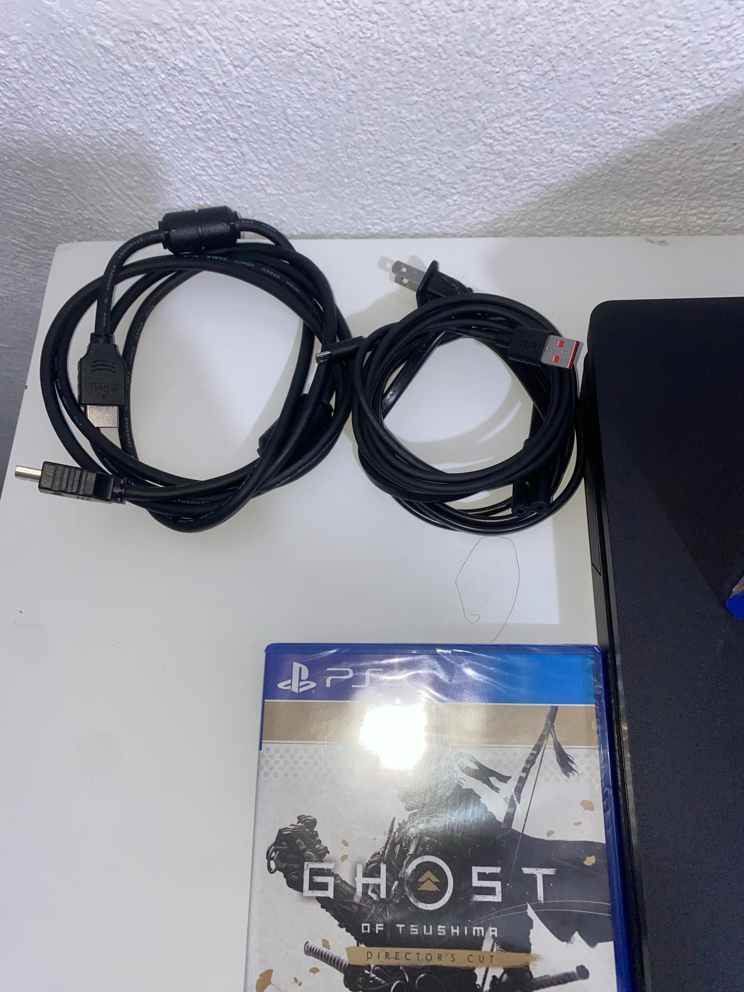 consolas y videojuegos - Ps4 Slim de 1Tb, 10/10 Como nuevo, Con Dos juegos incluidos y todos sus cables 7