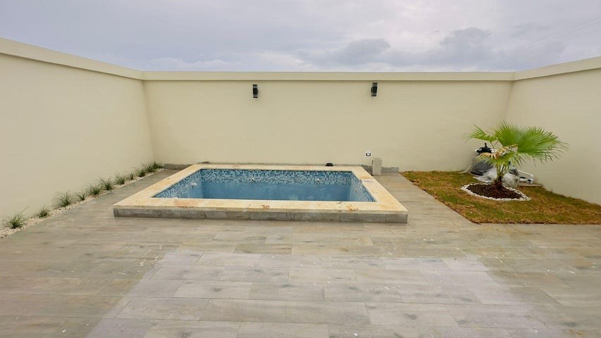 casas - Proyecto en venta Punta Cana #23-1036 tres dormitorios, jardín con piscina priva 5