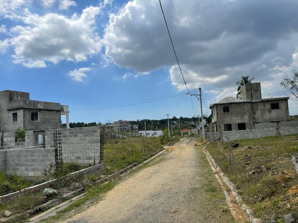 solares y terrenos - vendo terreno a credito y al contado en santo domingo