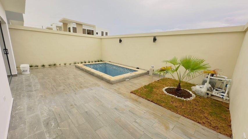 casas - Proyecto en venta Punta Cana #23-1036 tres dormitorios, jardín con piscina priva 6