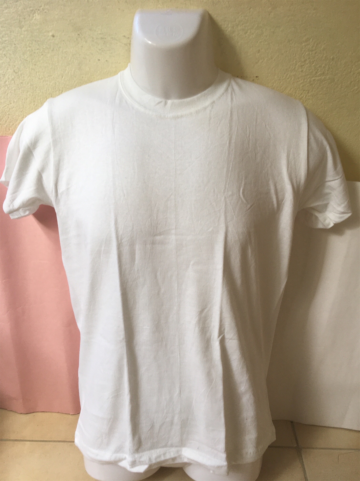 ropa para hombre - Poloche de algodón liso solo blanco y negro 6X1000 peso y 12X1.600  peso