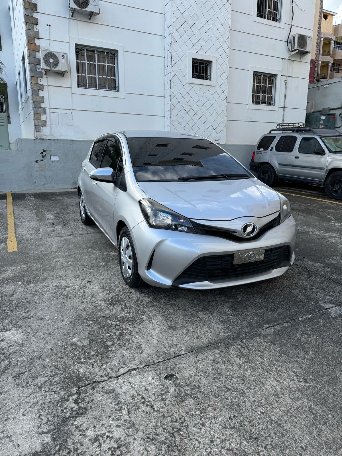 carros - Toyota Vitz 2015 - Santiago  1