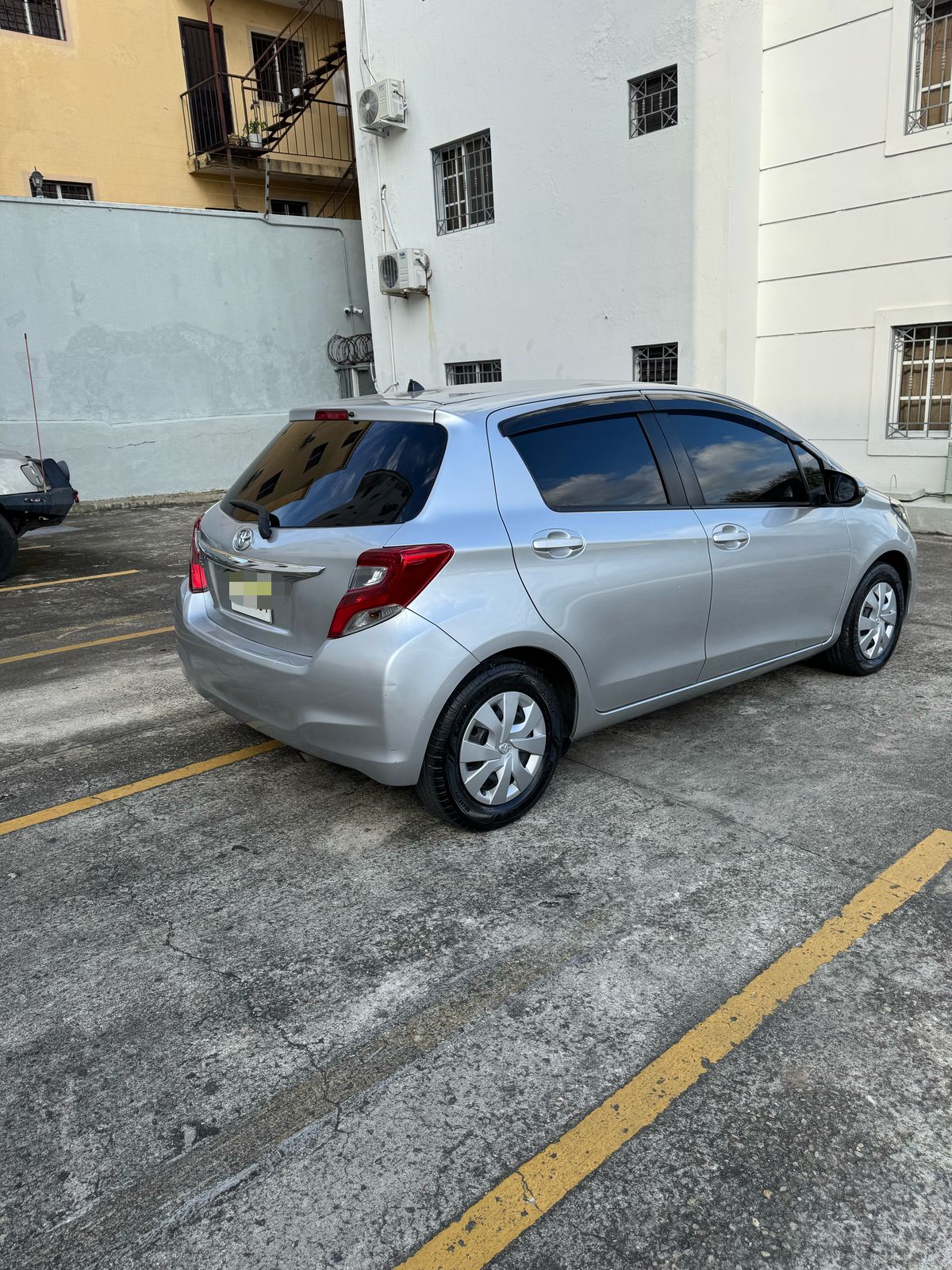 carros - Toyota Vitz 2015 - Santiago  5