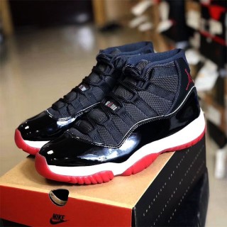 Corotos Jordan 11 retro negro con rojo Nuevo