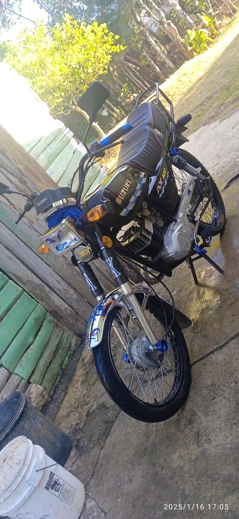 motores y pasolas - Suzuki ax 100