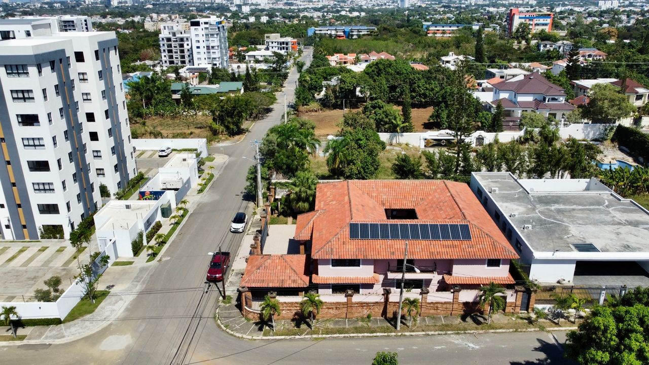 solares y terrenos - TERRENO CON MEJORA DE 835MTS2 URBANIZACION THOMEN SANTIAGO  0