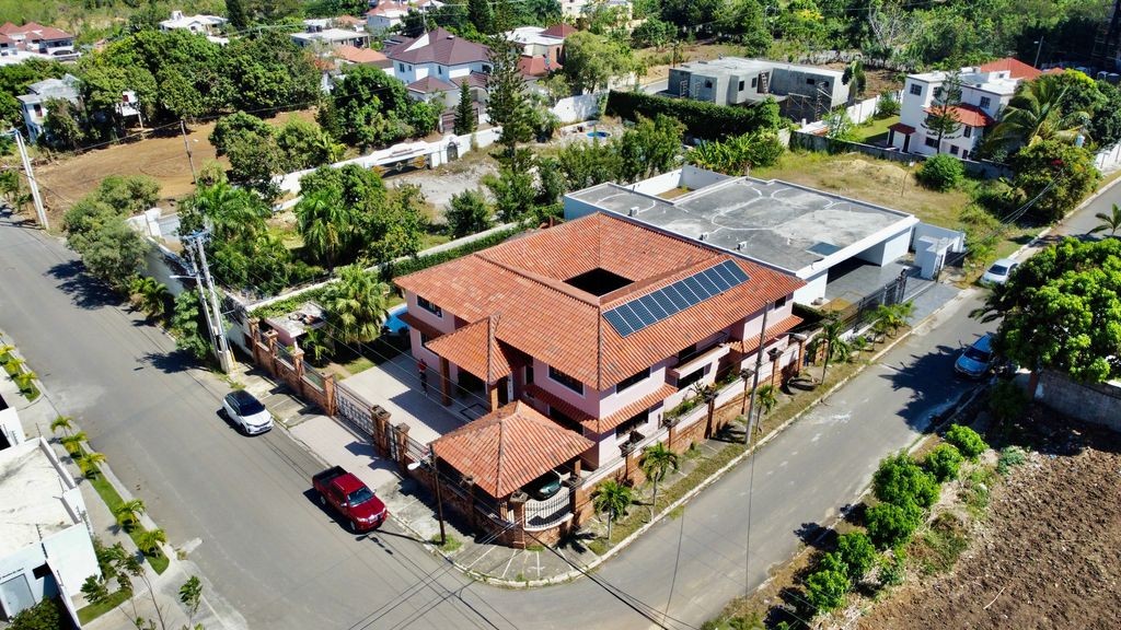 solares y terrenos - TERRENO CON MEJORA DE 835MTS2 URBANIZACION THOMEN SANTIAGO  1