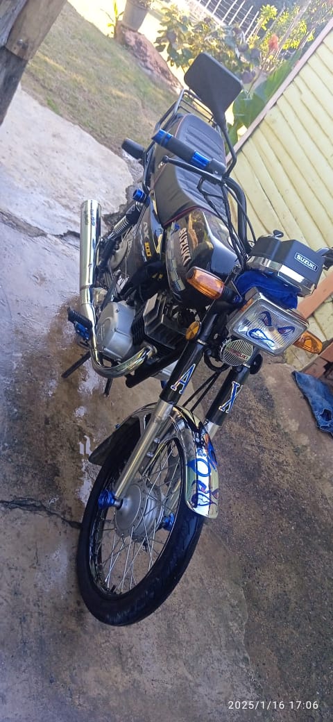 motores y pasolas - Suzuki ax 100 2