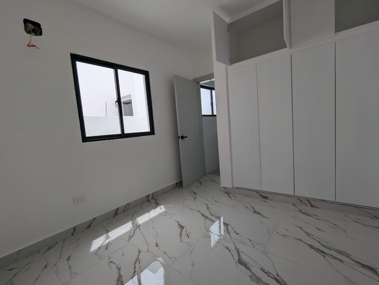 casas - casa en venta en residencial don Juan 2 en ciudad la romana  9