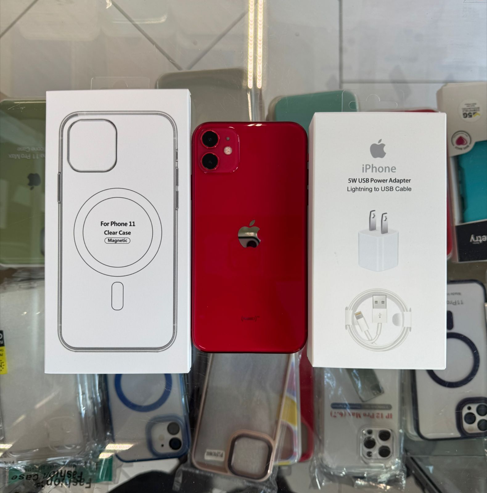 celulares y tabletas - Iphone 11 ROJO 64 GB desbloqueado.