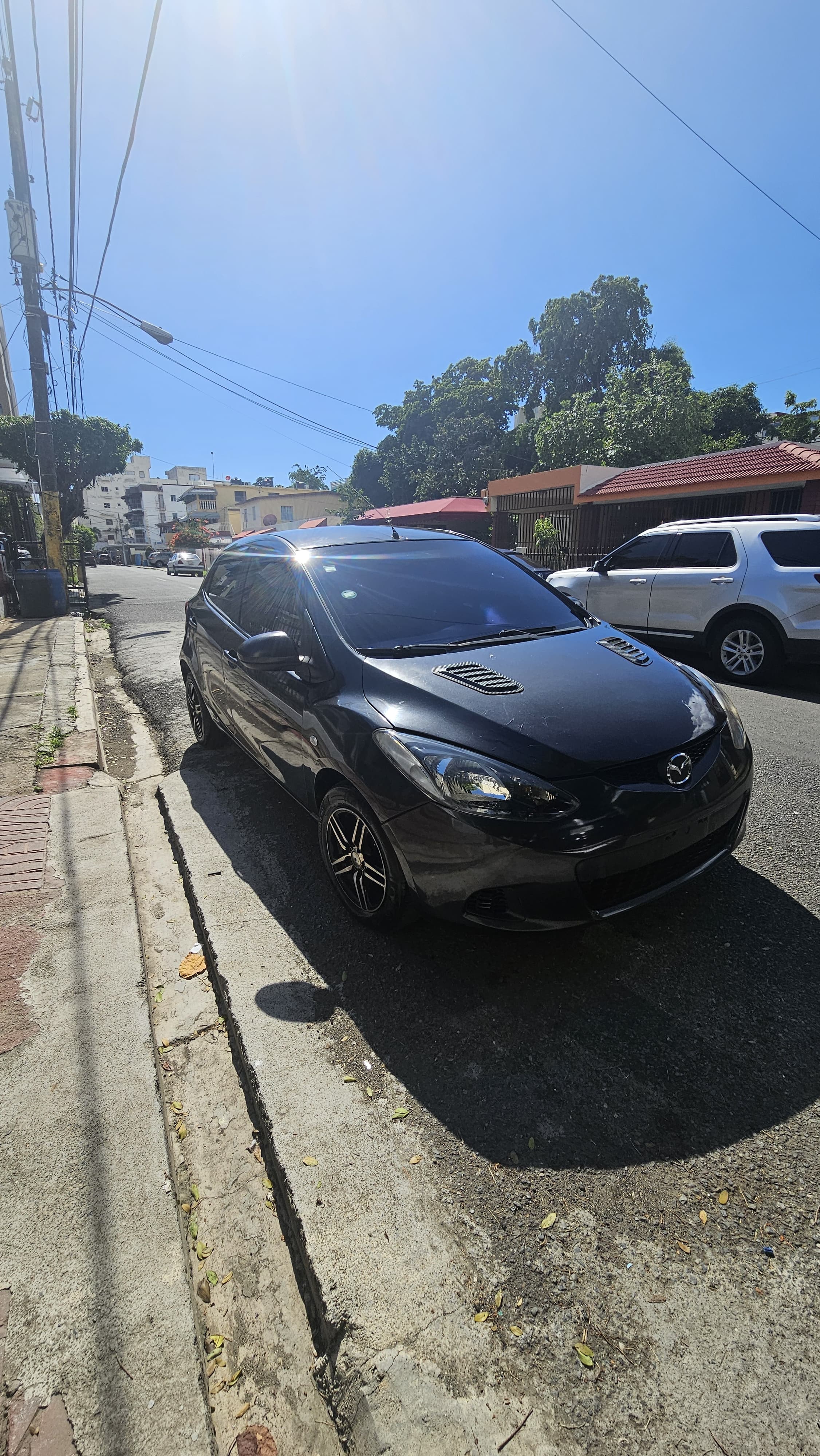 carros - mazda Demio 2009