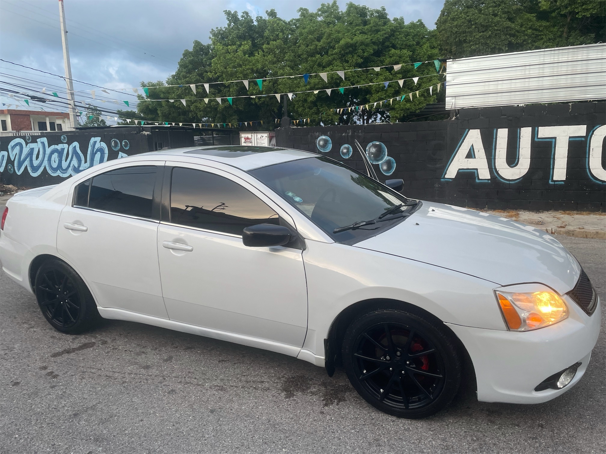 carros - Vendo Mitsubishi galant full asiento en leather de fábrica, aros de lujos