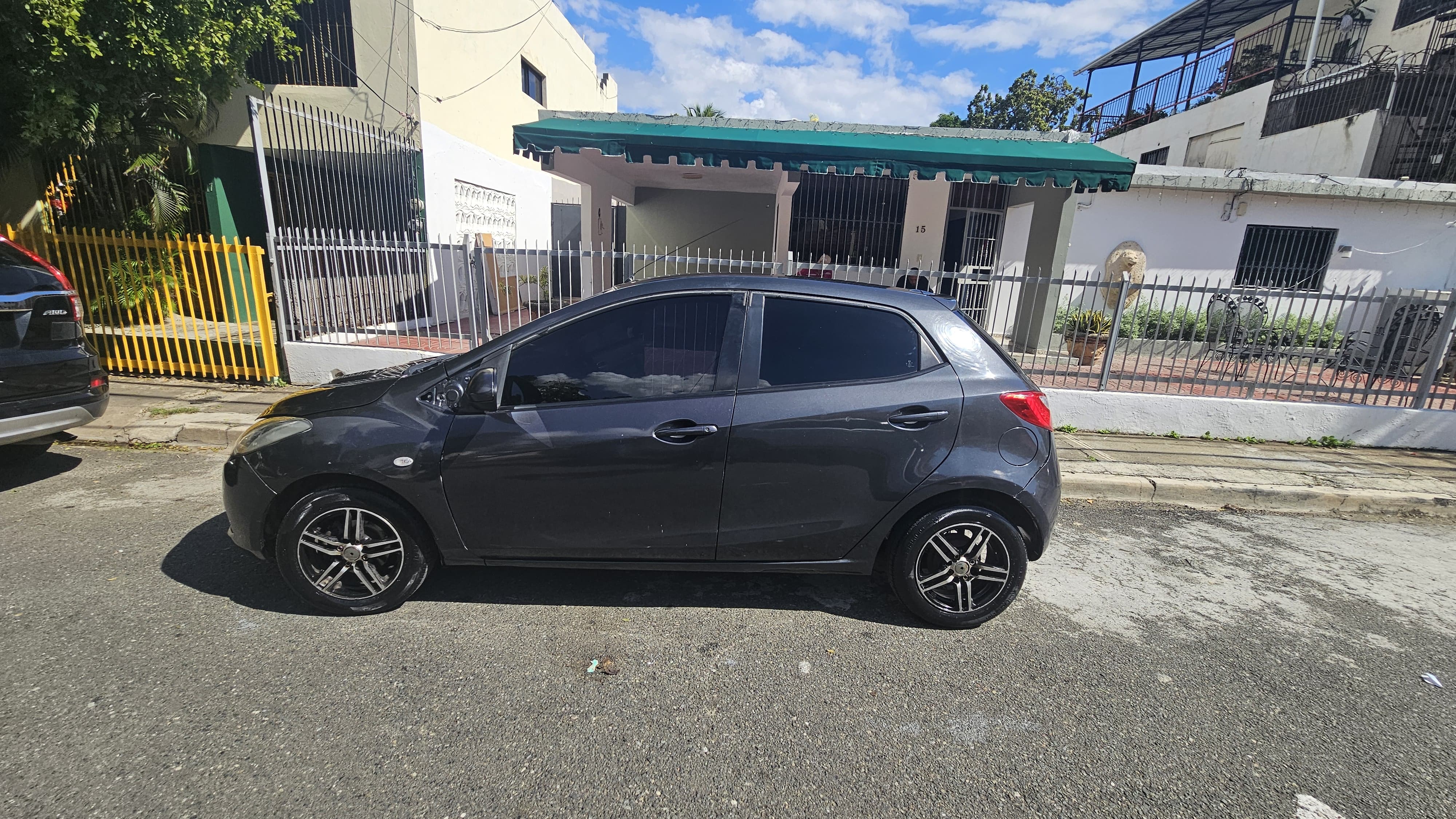 carros - mazda Demio 2009 3