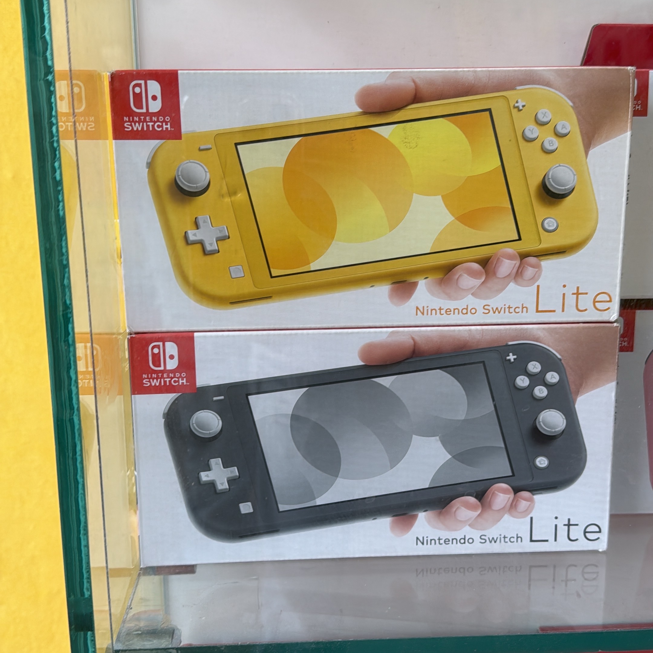 consolas y videojuegos - Nintendo switch lite nueva gris y amarilla 